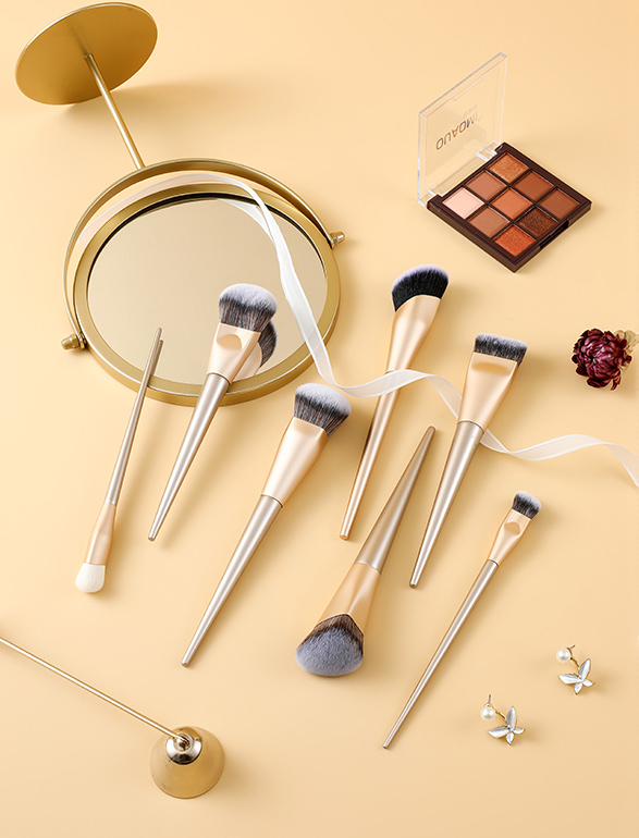Professional gold-handle makeup brush set with mirror and eyeshadow palette