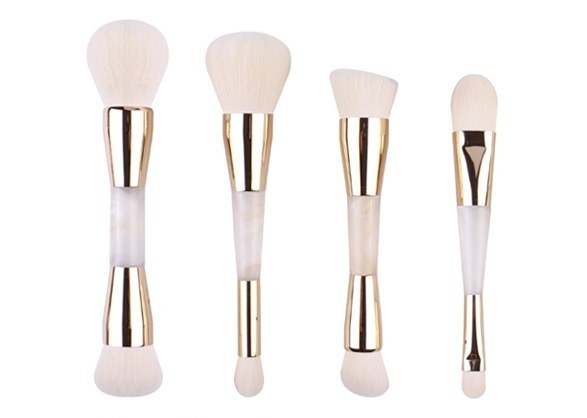 Dual-ended makeup brushes with contrasting head shapes for blending and detail application