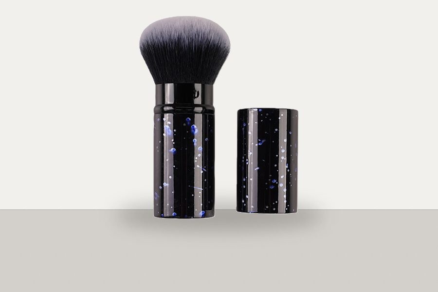Portable retractable makeup brush with protected storage for travel and touch-up use